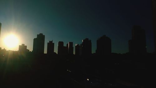 View of cityscape against sky during sunset