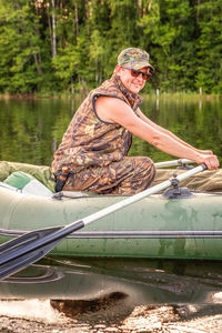 Portrait of a man in boat on lake
