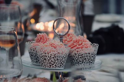 Close-up of cake on glass table