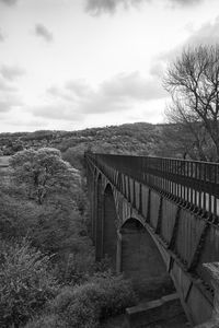 Bridge over land against sky