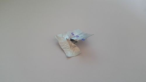 High angle view of paper decoration on white background