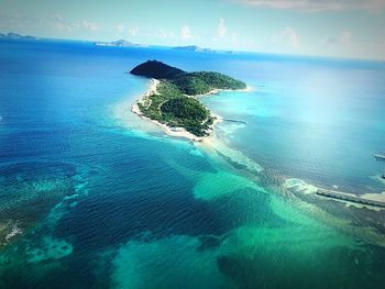 Scenic view of sea against blue sky