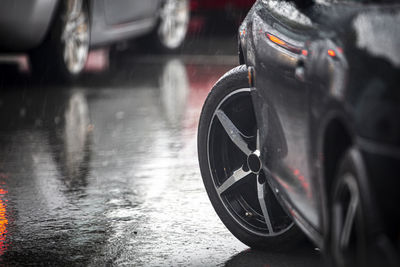 Car on wet road in rainy season