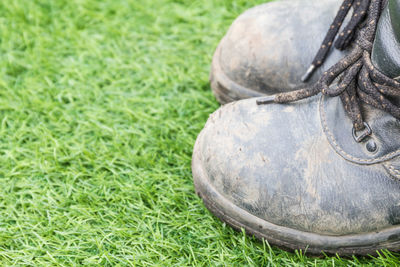 High angle view of shoes on field