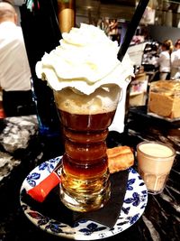 Ice cream in glass on table