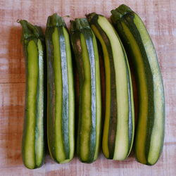 High angle view of peeled zucchinis on table