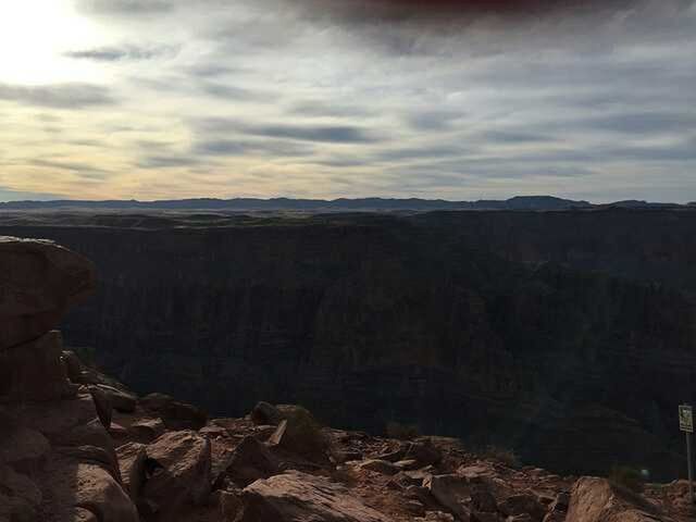 VIEW OF LANDSCAPE WITH MOUNTAIN IN BACKGROUND