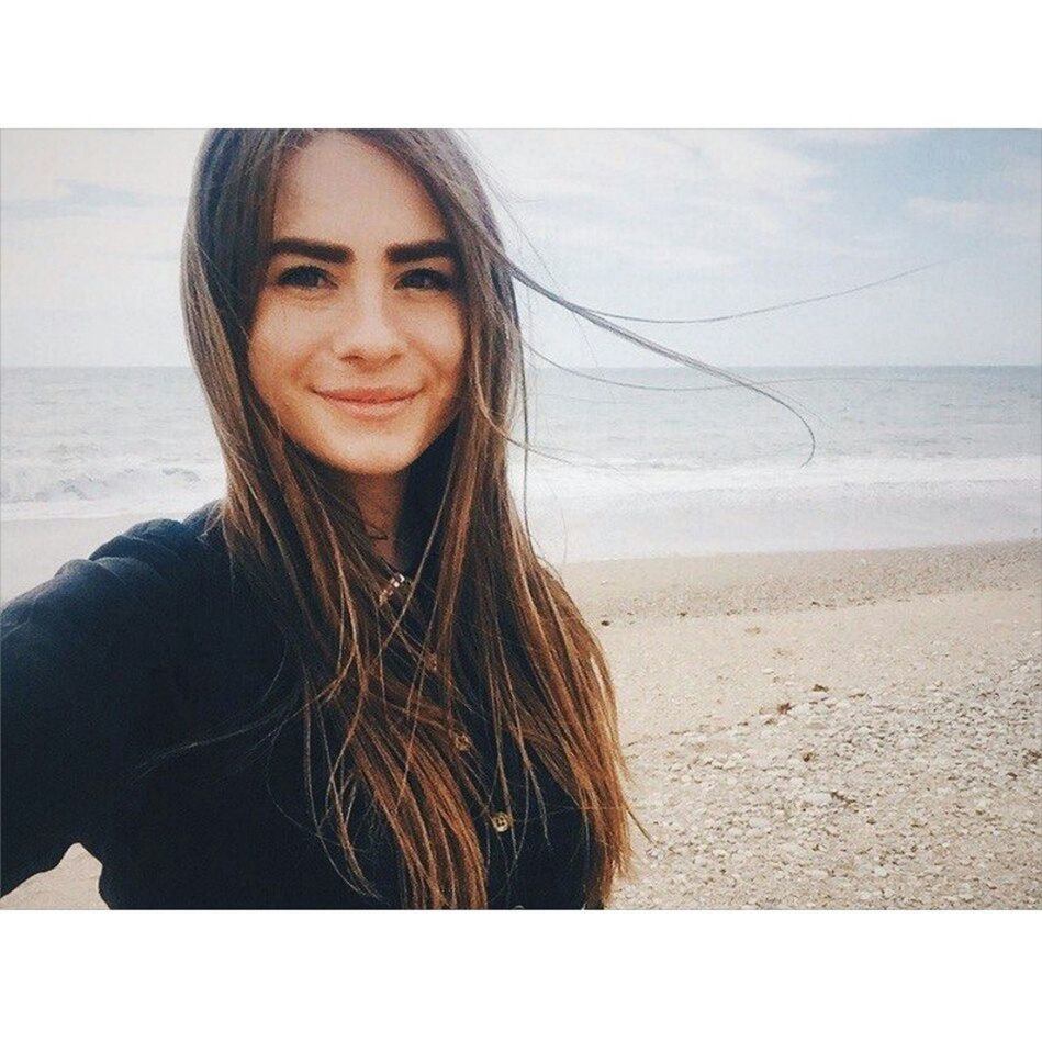 young adult, young women, person, portrait, sea, lifestyles, looking at camera, transfer print, leisure activity, long hair, beach, headshot, water, auto post production filter, horizon over water, front view, sky