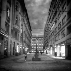 Street in city against sky