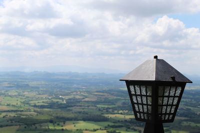 Built structure on landscape against sky