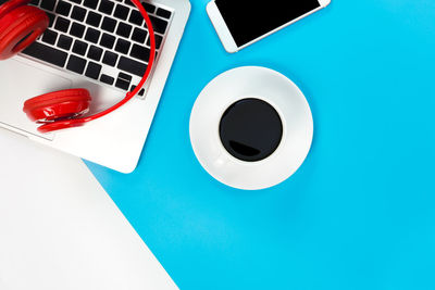 High angle view of coffee cup on table