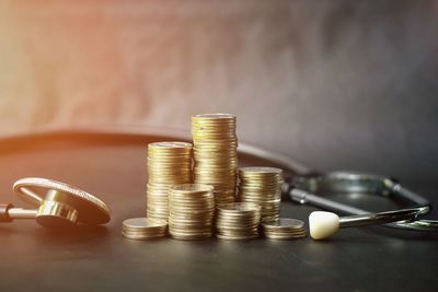 Close-up of coins on table