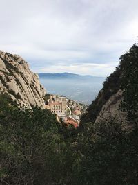 High angle view of town against cloudy sky