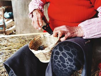 Midsection of man preparing food