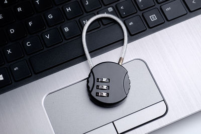 Close-up of lock on laptop keyboard