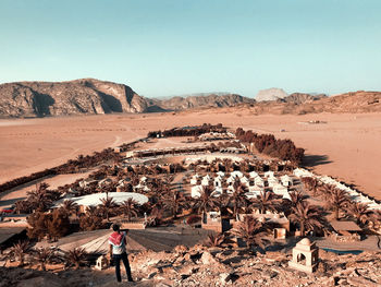 Scenic view of desert against clear sky