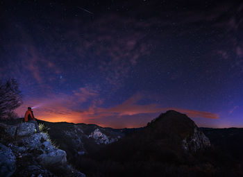 Scenic view of mountains at night