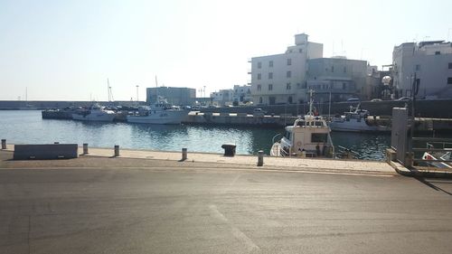 Boats moored in sea