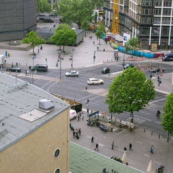 High angle view of people walking on road