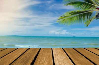 Scenic view of swimming pool by sea against sky