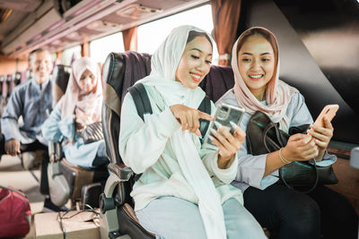 Young woman using mobile phone