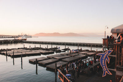 Scenic view of sea against clear sky during sunset