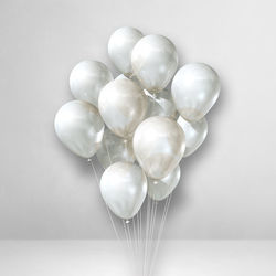 Close-up of balloons against white background