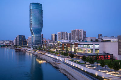 Illuminated buildings in city