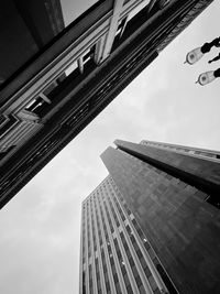 Low angle view of modern building against sky