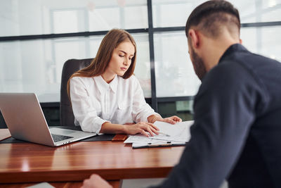 Business colleagues working at office