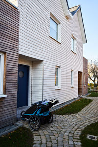 Street amidst houses in city