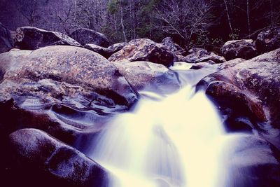 Close-up of water flowing through rocks