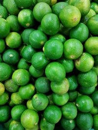 Full frame shot of green lemons