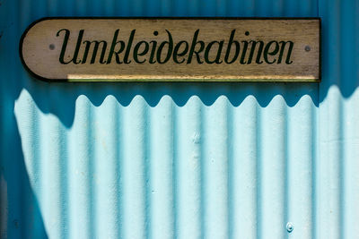 Close-up of text on wall
