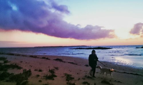 Scenic view of sea at sunset