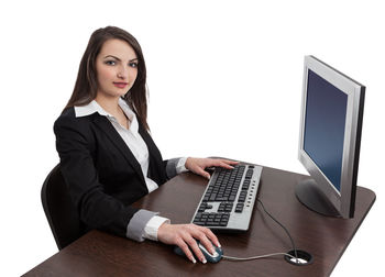 Portrait of young woman using mobile phone