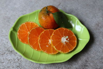 High angle view of orange fruit on table