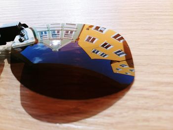 High angle view of information sign on table