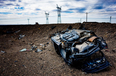 Garbage on field against sky