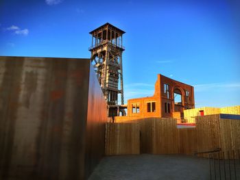 View of built structure against blue sky