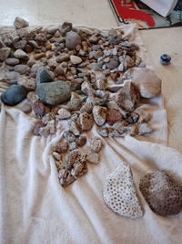 High angle view of pebbles on table