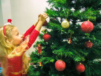 Girl with christmas tree