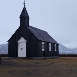 A small chapel on an island in winter