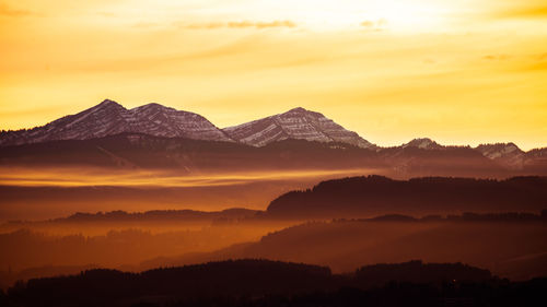 Scenic view of mountains during sunset