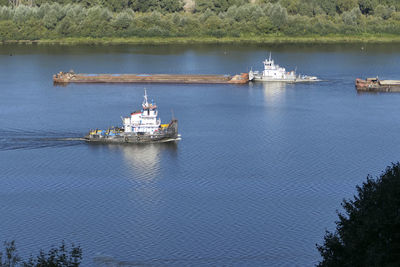 Water transport carrying goods along the river. . high quality photo