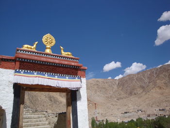 View of temple against cloudy sky