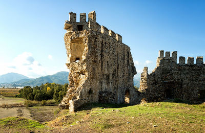 View of old ruin building against clear sky