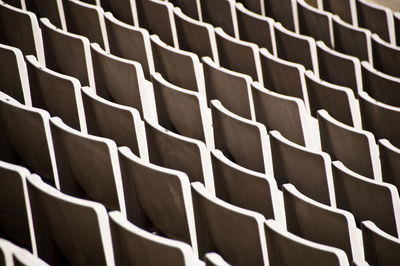 Full frame shot of empty chairs in stadium