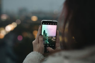 Woman using mobile phone