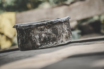 Close-up of pot on wooden table